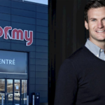 vd:n anders wall i skjorta, röd butiksskylt