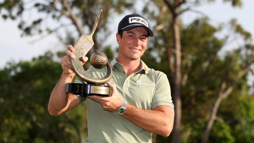 PALM HARBOR, FLORIDA - MARCH 23: Viktor Hovland of Norway poses with the trophy after putting in to win on the 18th green during the final round of the Valspar Championship 2025 at Innisbrook Resort and Golf Club on March 23, 2025 in Palm Harbor, Florida. (Photo by Brennan Asplen/Getty Images)