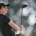 golfspelaren linn grant i svarta golfkläder