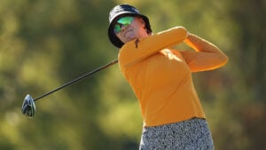 golfspelaren madelene sagström i orange golftröja