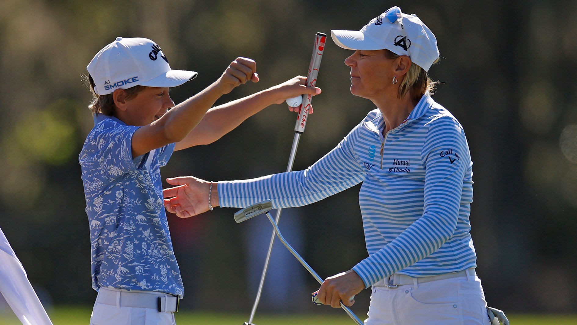 golfspelarna will mcgee och annnika sörenstam i ljusa golfkläder