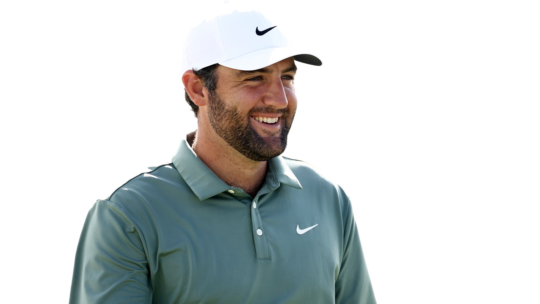 golfspelaren scottie scheffler i vit golfkeps