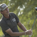 golfspelaren björn hellgren i militärgröna golfkläder