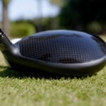 svart golfklubba från cobra