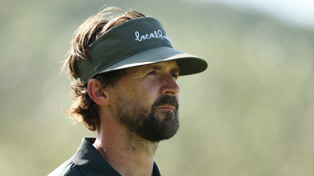 golfspelaren rikard karlberg i en golfskärmkeps