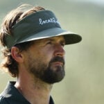 golfspelaren rikard karlberg i en golfskärmkeps