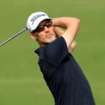 golfspelaren niklas lemke i svart golfpiké