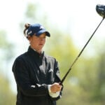 golfspelaren linn grant i svart golfkläder