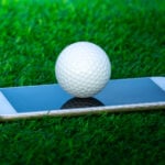 golfboll på mobiltelefon.
