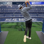 golfspelare i fotbollsstadium