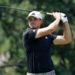 golfspelaren ludvig åberg i svart golfpiké