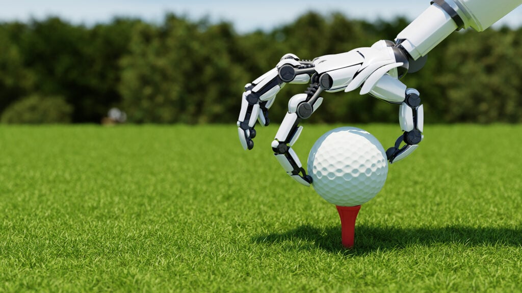 robotarm placerar golfboll på golfpeg