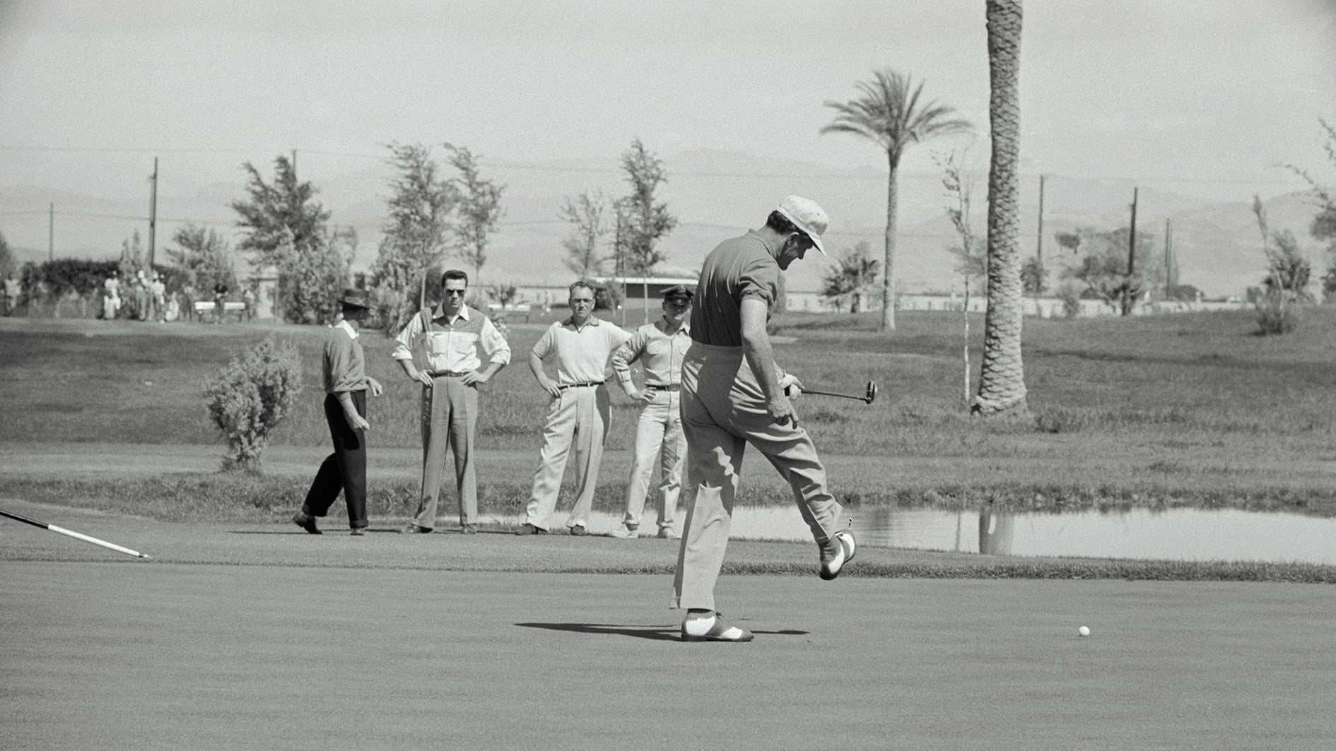 Tommy Bolt Kicking a Golf Ball
